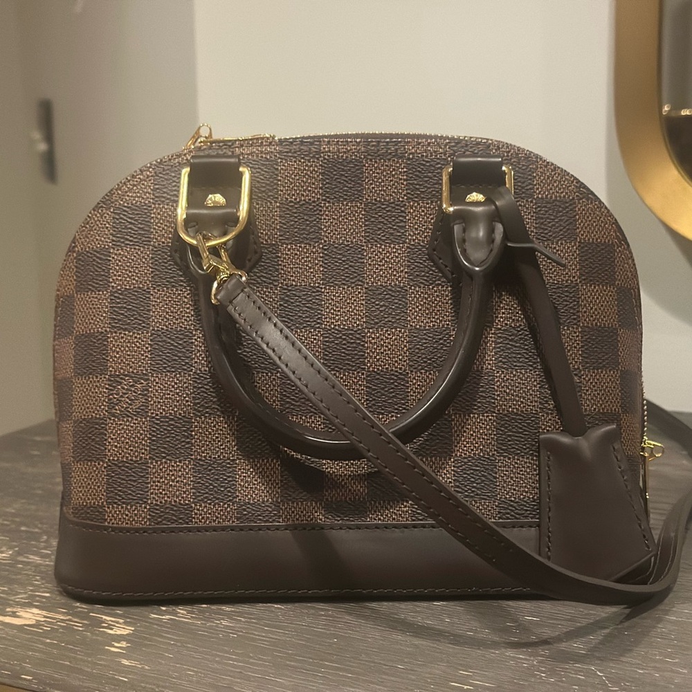 Louis Vuitton Brown Clutch with Red Interior